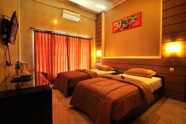 เดเนย์ส เฮาส์ Hotel จิมบาราน ห้อง รูปภาพ
